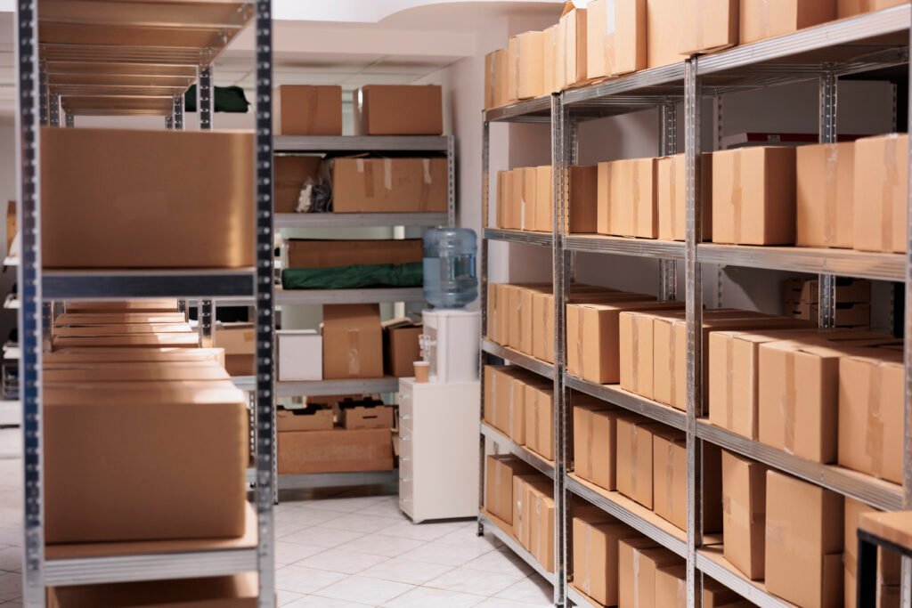 storehouse interior with stacked cardboard boxes on racks